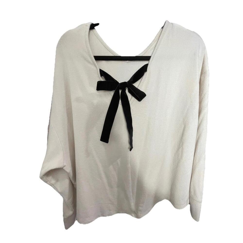 Maurices Womens Ivory Sweater with black bow on back Size Medium